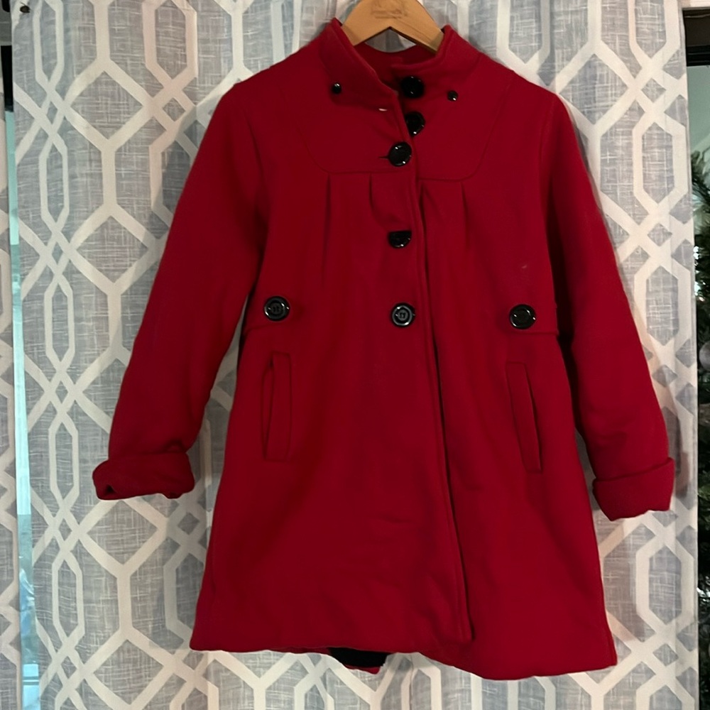 Red pea coat with black buttons and black fleece lined